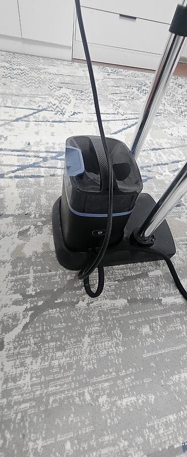 Для кафе, ресторанов: Гладильная система с парогенератором и вертикальной доской Tefal. - — 9