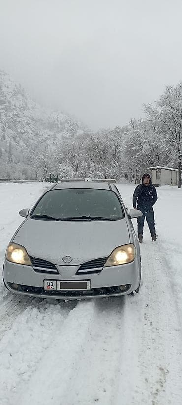 Nissan Primera P12 Европеец 2004 год Универсал серебристого