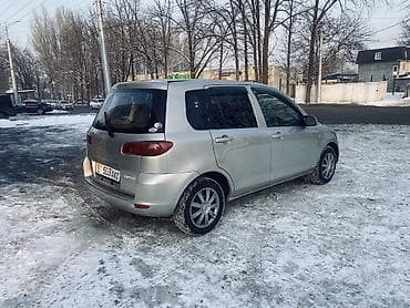 кассеты аудио: Mazda Demio: 2003 г., 1.3 л, Автомат, Бензин, Хэтчбэк — 7