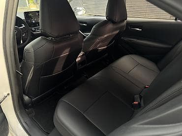 микра афтобус: Toyota Corolla: 2019 г., 1.8 л, Вариатор, Гибрид, Седан — 8