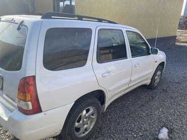 mazda 3: Mazda Tribute: 2001 г., 2 л, Автомат, Бензин, Кроссовер — 4