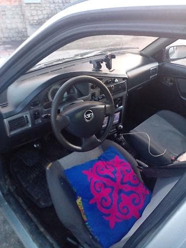 митцубиси спейс стар: Daewoo Nexia: 2007 г., Седан — 5