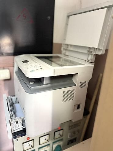 Принтеры: МФУ Canon imageRUNNER 1133 - Черно-белое многофункциональное — 3