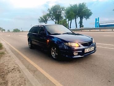 Mazda Familia: 2002 г., Хэтчбэк — 4