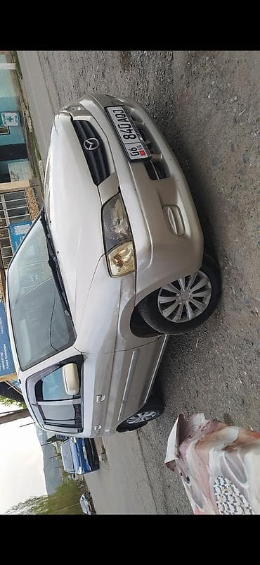 bmw e29: Mazda Demio: 2002 г., 1.3 л, Автомат, Бензин — 5