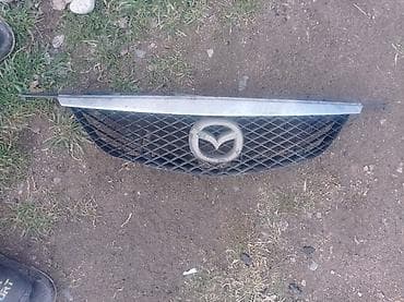 Решетка радиатора Mazda Оригинал