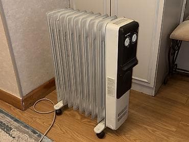 Масляный обогреватель Кол-во секций: 9, Встроенный вентилятор