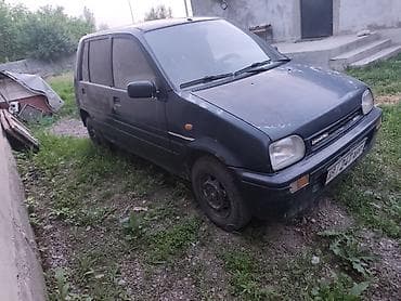 кассеты аудио: Daihatsu Cuore: 1993 г., 1.1 л, Механика, Бензин, Хэтчбэк — 3