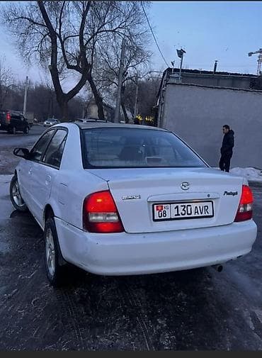 step 2: Mazda Protege: 2003 г., 2 л, Автомат, Бензин, Седан — 2