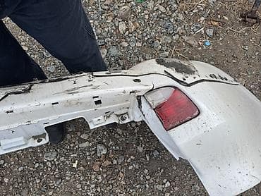 x trail: Бампер Lexus — 1