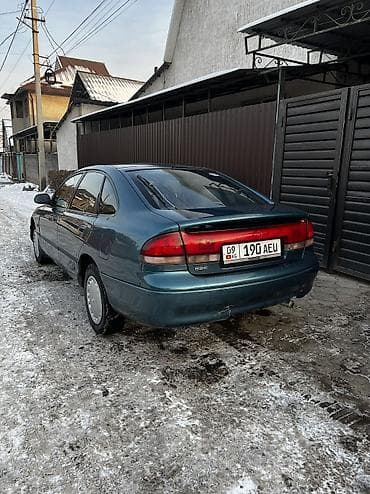 привазной матор 1: Mazda : 1993 г., 2 л, Механика, Бензин, Хэтчбэк — 8