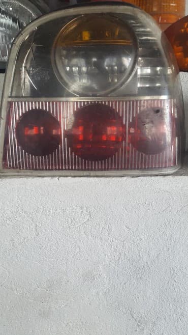 купить дом за городом: Golf III правый плафон — 1