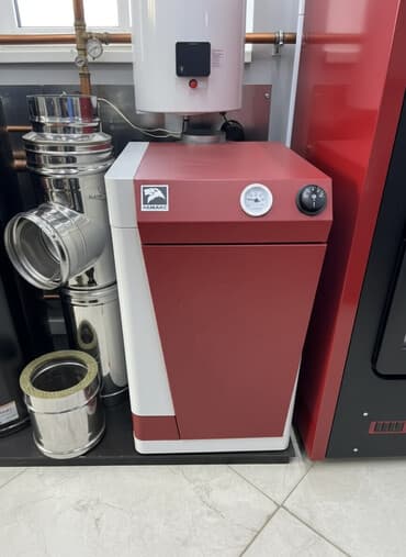 Твердотопливный котёл Тип управления: Автоматический