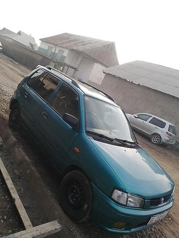 deu labo: Mazda Demio: 1999 г., 1.3 л, Механика, Бензин, Минивэн — 1