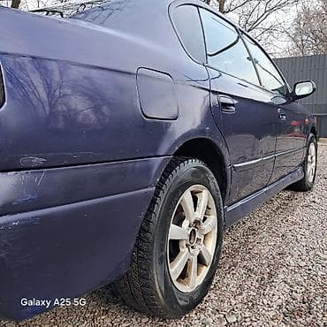 крыло на лексус: Седан темно-синего цвета, 4 двери. Компактный класс, кузов с — 5