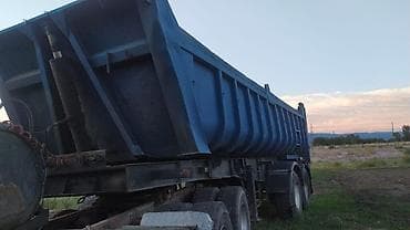 Унаа: Полуприцеп-самосвальный кузов (тягач на фото для иллюстрации). - — 1