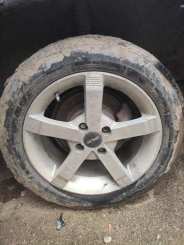 Литые диски SHLK 15" с шинами 185/65 R15 - Комплект из 4 шт. (на фото — 4
