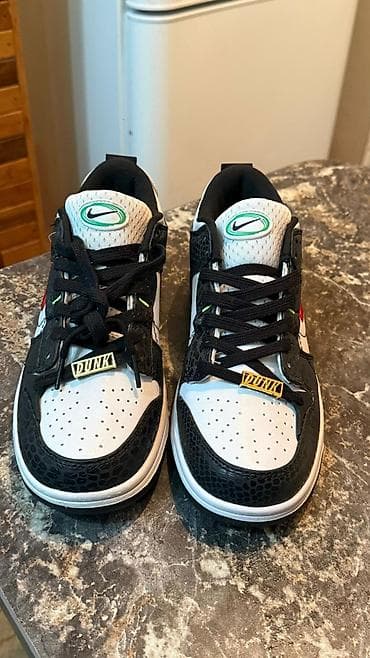 Туфлилер: Кроссовки Nike Dunk Low (модель Just Do It) - Силуэт: низкий профиль — 1