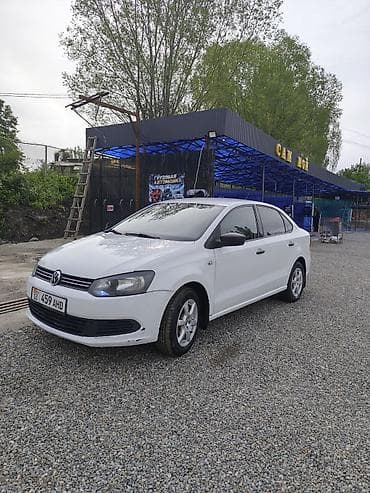 кормушки для животных: Volkswagen Polo: 2014 г., 1.6 л, Механика, Бензин, Седан — 5