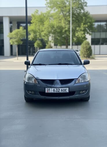 скутер ош бу: Mitsubishi Lancer: 2004 г., 1.6 л, Механика, Бензиновая, Седан — 1