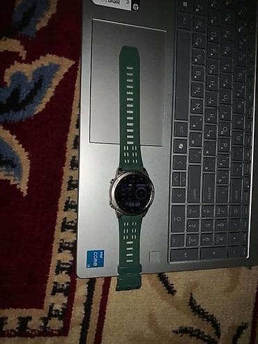 самсунг галакси вотч актив 2: Смарт-часы с круглым дисплеем и зеленым спортивным ремешком. Основные — 1