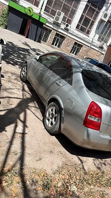 red cell: Nissan Primera: 2002 г., Автомат, Седан — 5