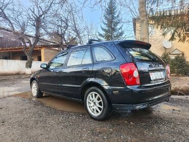 Продажа авто: Mazda 323: 2003 г., 1.6 л, Механика, Бензин, Универсал — 5