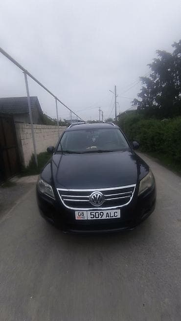 катафоты: Volkswagen Tiguan: 2011 г., 2 л, Автомат, Бензин, Кроссовер — 7