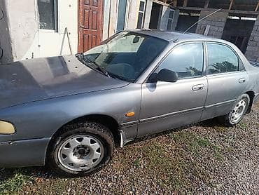 bid e2: Mazda 323: 1992 г., 1.8 л, Ручные, Бензин, Седан — 6