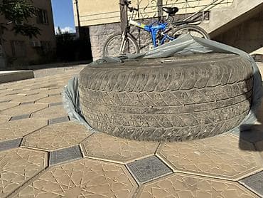 колесо вагон: Диск с шиной для внедорожника/кроссовера. - Шина: Dunlop Grandtrek — 2