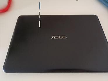 Техника и электроника: Ноутбук ASUS, компактный и тонкий, классический черный корпус с — 1