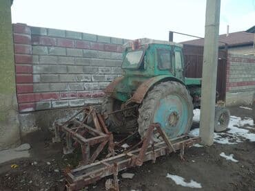 тырактор: Трактор с навесным оборудованием (борона/культиватор) Описание: - — 3