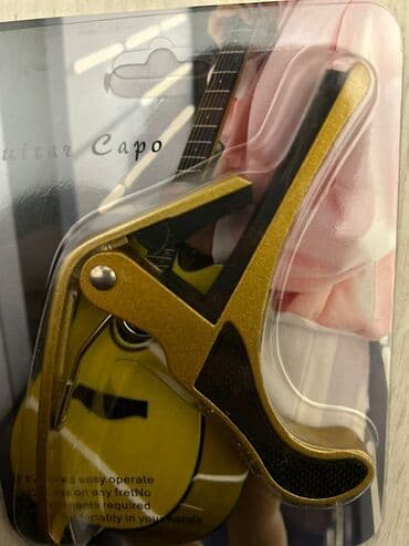 полуакустическая электрогитара: Каподастры, зажим для гитары — 3