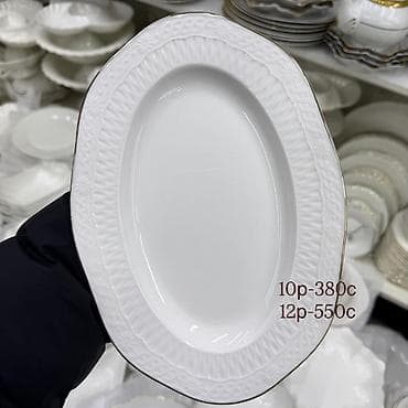 Посуда: Белая сервировка из фарфора с рельефным узором. Состав и размеры — 6