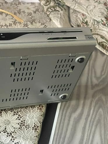 внешний dvd rom: Портативный DVD-плеер с ТВ‑тюнером (DVB) - Компактный корпус с — 1