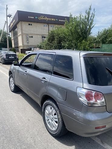 lancer 10: Mitsubishi Airtrek: 2001 г., 2 л, Автомат, Бензин, Кроссовер — 4