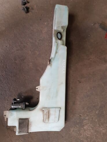 омыватель лобового стекла: Nissan X Terra бачок омывателя, Ниссан Икстерра Бачок омывателя — 1