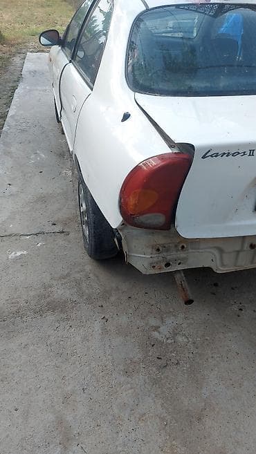daewoo centra: Daewoo Lanos II, бензин, механическая коробка передач. Белый седан — 2