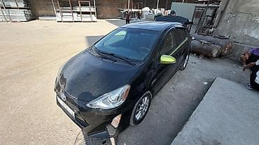 e2 byd: Toyota Prius C: 2016 г., Автомат, Гибрид, Хэтчбэк — 1