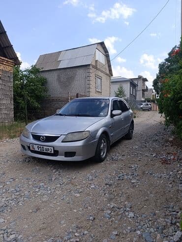 опел зафира б: Mazda 323: 2001 г., 1.6 л, Механика, Бензин, Хэтчбэк — 1