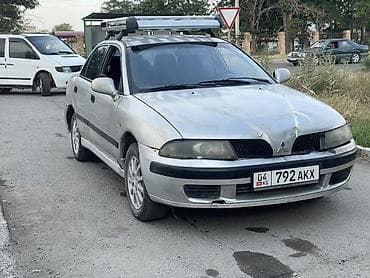e55 compressor: Mitsubishi Carisma: 2002 г., 1.6 л, Механика, Бензин, Седан — 1