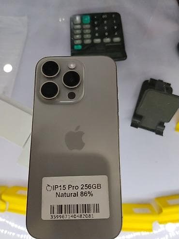 Техника и электроника: IPhone 15 Pro, 256 ГБ, цвет Natural Titanium. На стикере указано — 1