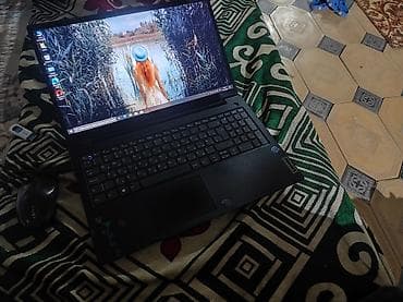 watch 11: Ноутбук Lenovo в черном корпусе. Оснащен процессором Intel Celeron — 1