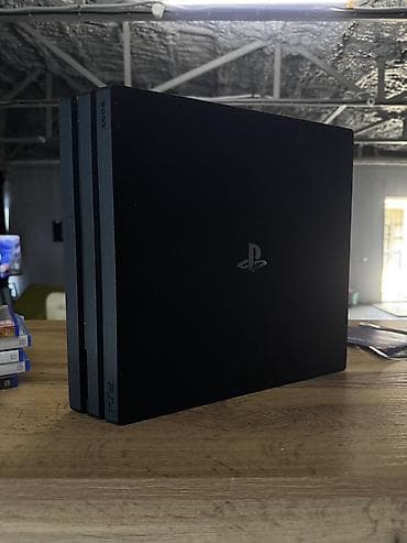 Игровая консоль Sony PlayStation 4 Pro (черная) без игр пустая at lalafo.kg Игровая консоль Sony PlayStation 4 Pro (черная) без игр пустая