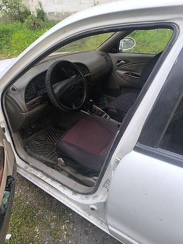 опель омега а: Daewoo Nubira: 1999 г., 1.5 л, Механика, Бензин, Седан — 4