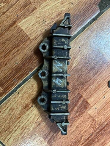 совместимые расходные материалы япония abs пластик: Успокоитель цепи с неизвестного японского автомобиля. Успокоитель — 1