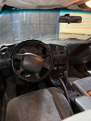 Mitsubishi Galant — салон - Просторный 5‑местный интерьер с мягкими