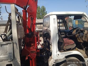 купить грузовой автомобиль с манипулятором бу: Манипулятор, Nissan, 1986 г. — 1