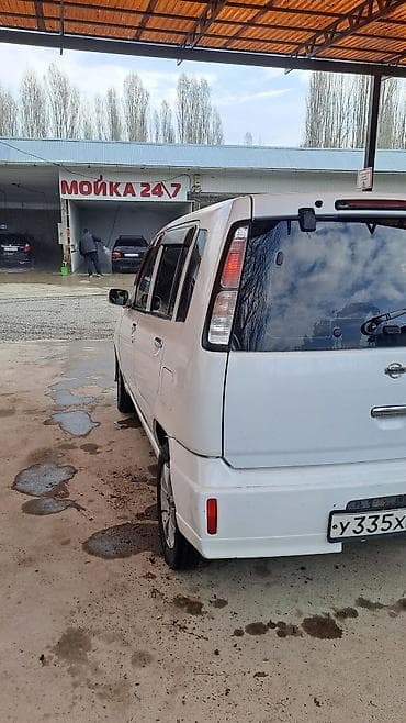 ом 615: Nissan Cube: 2002 г., 1.3 л, Автомат, Бензин, Седан — 7