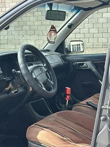 выхлопы машин: Volkswagen Vento: 1996 г., 1.8 л, Механика, Бензин, Седан — 7